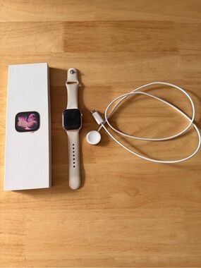 Apple Watch S11 in Rose gold with White Magnetic Charger and box